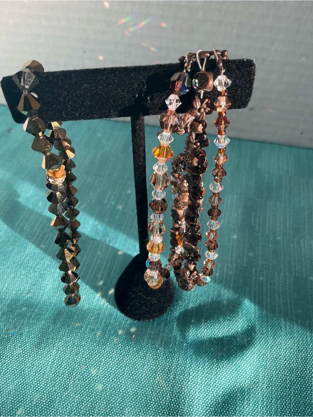 3 strand toggle & single stretch crystal & bronze bead bracelet. 8”